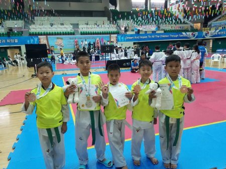 Монгол хүүхдүүд БНСУ-д болсон ОУ-ын таеквондогийн нөхөрсөг тулаанд амжилт дүүрэн оролцлоо